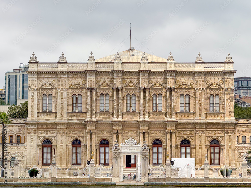 Naklejka premium Dolmabahce Palace view from the Bosphorus in Istanbul. Ottoman architecture, cultural heritage and historical tourism in Turkey.