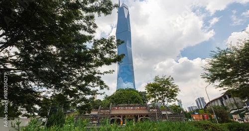 Kuala Lumpur, Malaysia – September 8, 2025: Time-lapse view of Merdeka 118 tower with fast-moving clouds and shifting light, highlighting Malaysia’s modern skyline second tallest building in the world