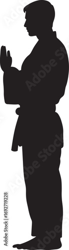 A martial artist standing straight, bowing slightly in respect. full length silhouette black vector illustration