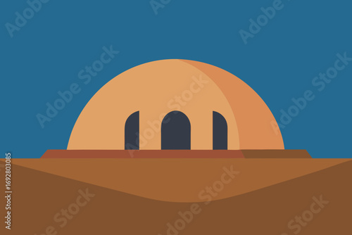 Desert dwelling with arched doorways under a clear blue sky