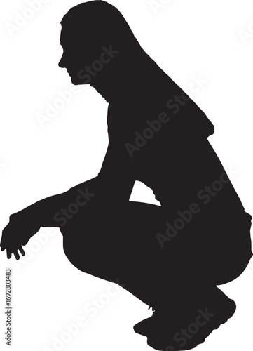 vector,side view of a silhouette of a woaman sitting on her haunches