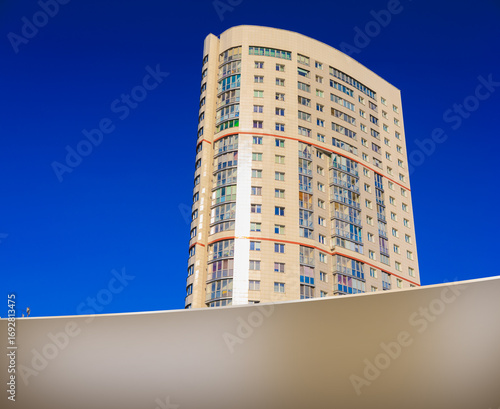Canvas Print City view, modern buildings and skyscrapers against the blue sky.