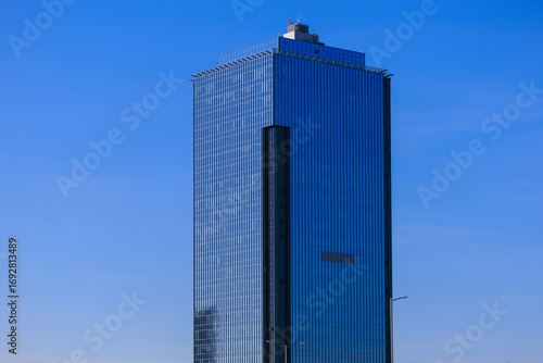 Canvas Print City view, modern buildings and skyscrapers against the blue sky.
