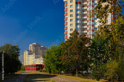 Canvas Print City view, modern buildings and skyscrapers against the blue sky.