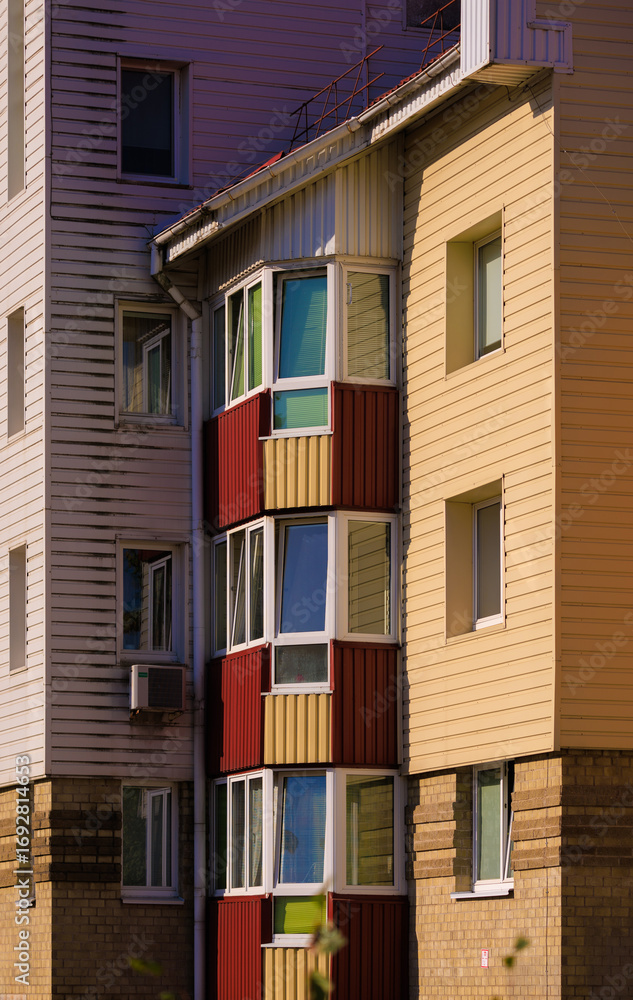 Obraz premium City view, modern buildings and skyscrapers against the blue sky.