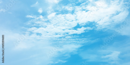 Blue clouds, sunny sunlight effect on the white fluffy clouds, rainy day, fresh natural weather background banner marketing image, surface splashed love day gift 