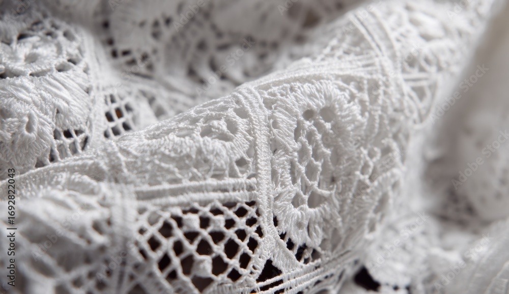 Obraz premium Close-up of intricate white lace (1)