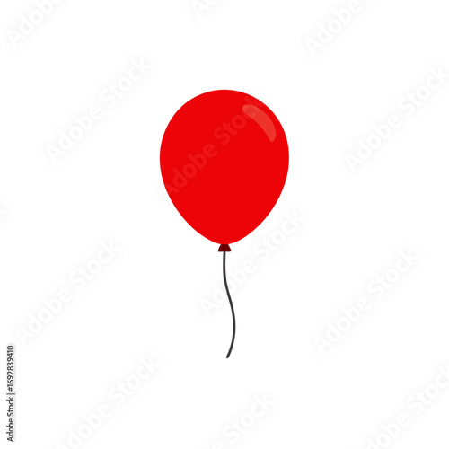 A single red balloon floating against a black background
