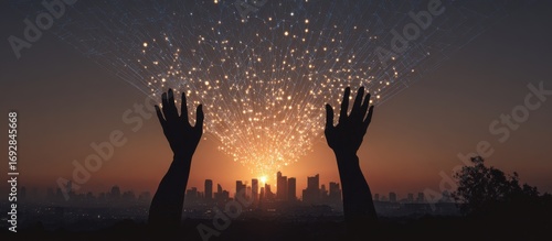 Silhouettes of hands reaching towards a sunrise over a city, with a dazzling light display