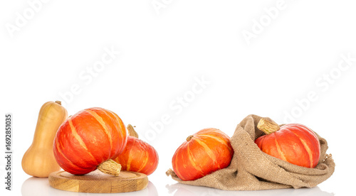 Ripe sweet pumpkins isolated on white background, close-up.