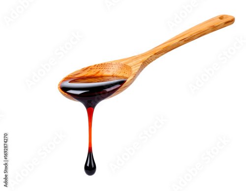 Wooden Spoon with Rich Molasses Drizzle, Warm Kitchen Setting