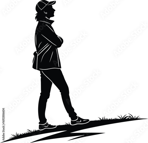 Woman standing outdoors in silhouette