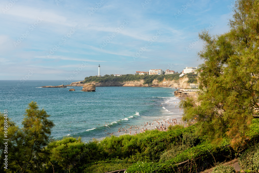 Naklejka premium Biarritz, France, 11th of August, 2025. View on the ocean and part of Main beach of Biarritz, La Grande Plage from the park side. Summer day.
