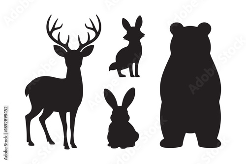 Silhouette collection of forest animals including deer bear and rabbits