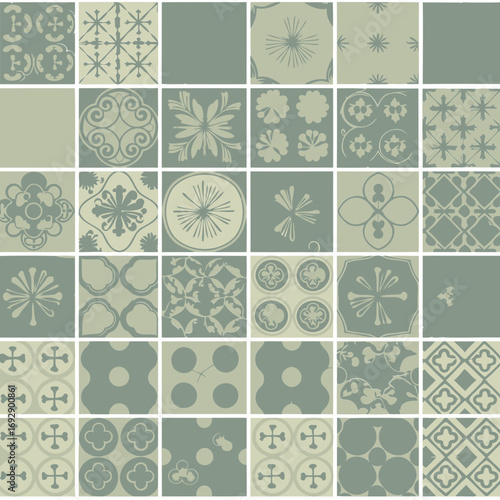 Vintage-style decorative tile design with light sage green and beige colors. Set of repeating patterned squares with decorative Asian-inspired designs.