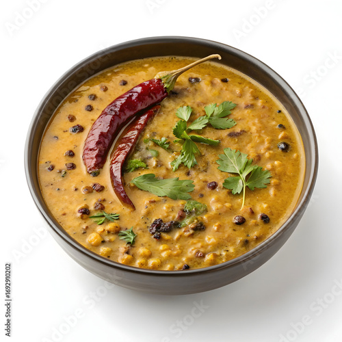 Hearty urad dal curry made with black gram lentils, slow-cooked with spices in a rich gravy