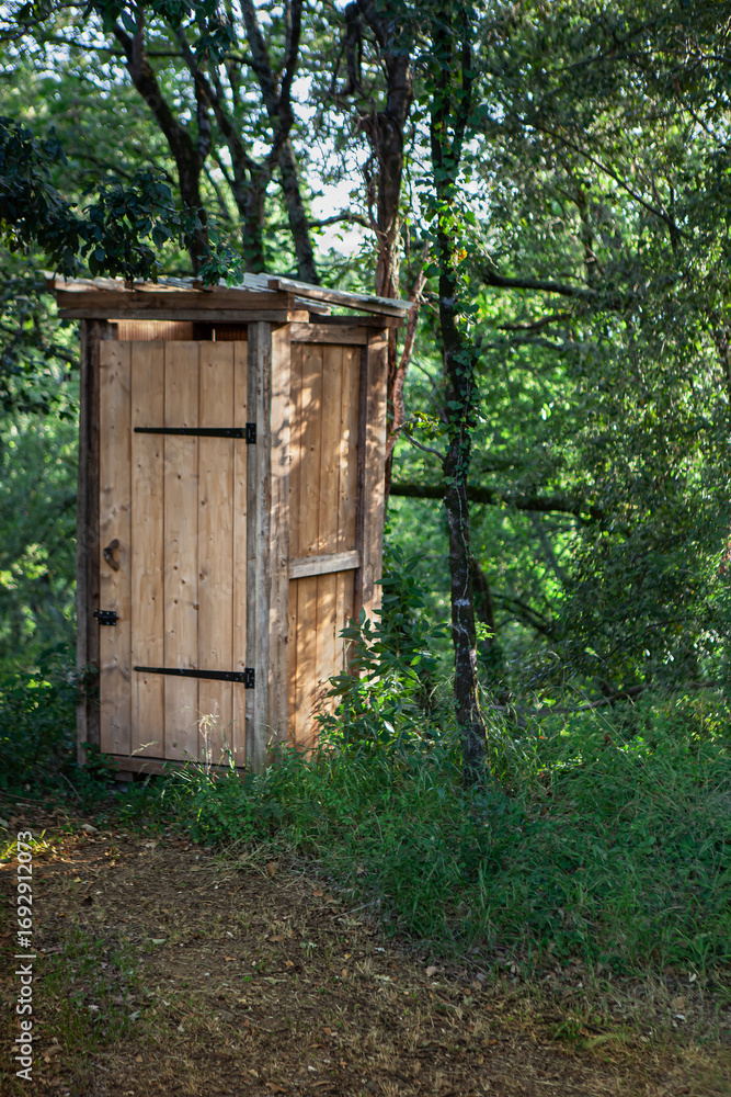 Fototapeta premium Small wooden shed by the roadside