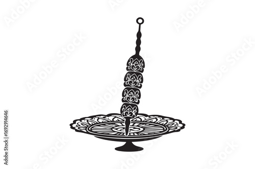 Ornate metal serving stand with hanging food skewers