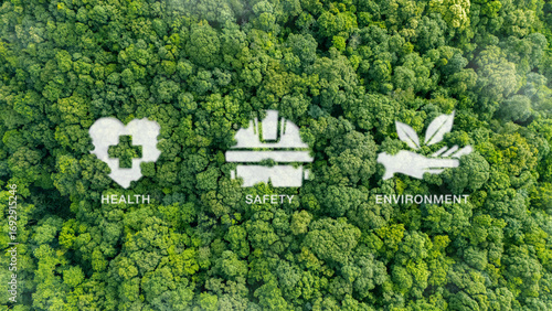 HSE Health, Safety, Environment Concepts that focus on accident prevention, environmental protection, health safety for businesses and organizations. HSE icon symbol, bird's eye view of lush forest.