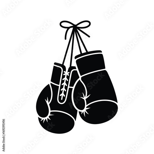 Black silhouette of boxing gloves hanging on a string