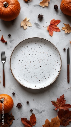 Autumn Table Setting With Decorative Pumpkins and Autumn Leaves Ready for a F...