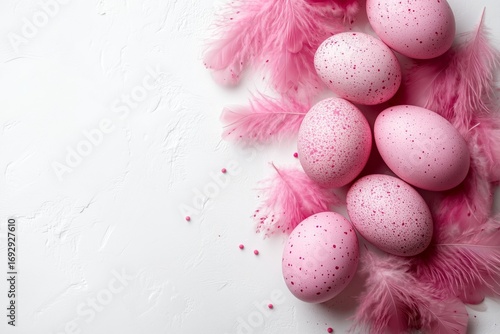 Pink Eggs and Feathers Create a Festive Atmosphere for Celebration or Decoration