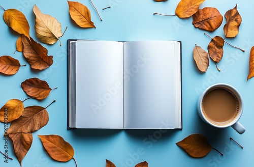 Cozy Autumn Afternoon With an Open Book and Warm Coffee on a Blue Table