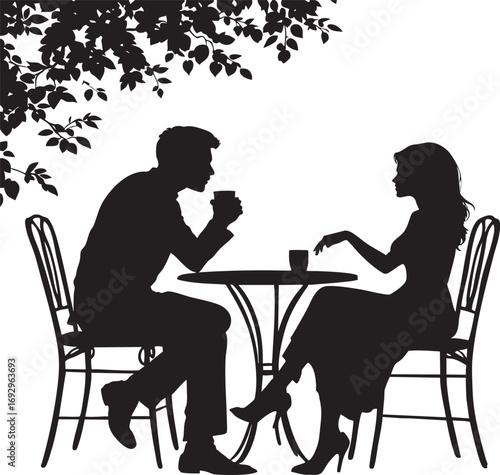Silhouette of a man and a woman enjoying a coffee date at an outdoor cafe.