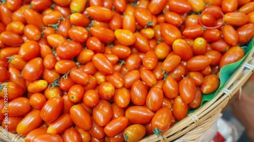 Healthy food, lots of Cherry Tomatoes, placed on a tray.