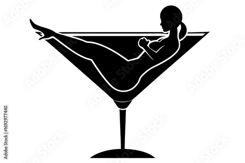 Vector art of silhouette of a woman reclining inside a martini glass, a playful design