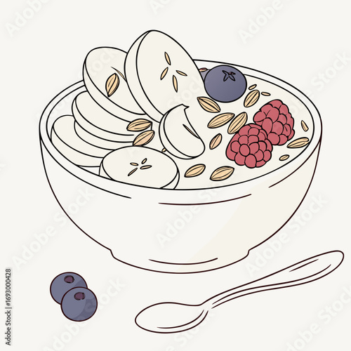 Delicious bowl of oatmeal topped with fresh banana slices, vibrant raspberries, blueberries, and crunchy almonds, perfect for a healthy breakfast.