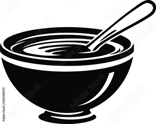 (53)Food icon with bowl and spoon depicting liquid or semi-liquid meal in black and white vector style for kitchen and dining themes
