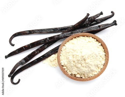 Vanilla beans and powder on white background