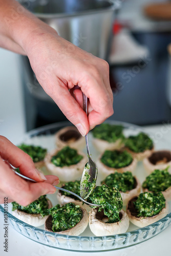 Stuffed mushrooms are prepared with spinach filling