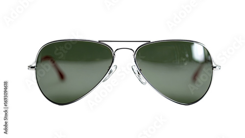 Close-up of aviator-style sunglasses.  Dark-tinted lenses,  metal frame