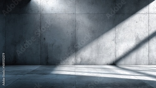 Empty concrete room with sunlight streaks