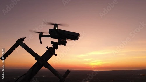 Drone Perches on Broken Antenna at Sunrise