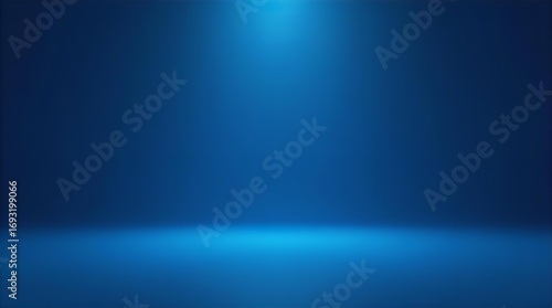 Empty blue studio room background with bright top and floor spotlights, ideal for modern product displays, virtual stages, tech presentations, and elegant backdrops.