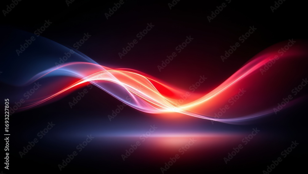 Fototapeta premium Colorful wave of light is displayed on a dark background. The colors are red, blue, and purple