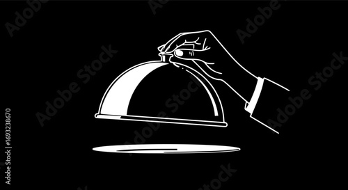 Hand holding Silver serving cloche raised above empty golden plate, cut out
