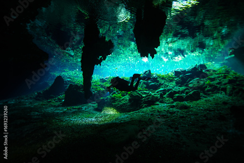 Cave Diver in Nicte Ha Cenote in the Yucatan Peninsula, Mexico