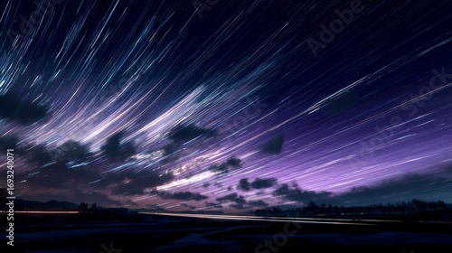 Star trails over landscape