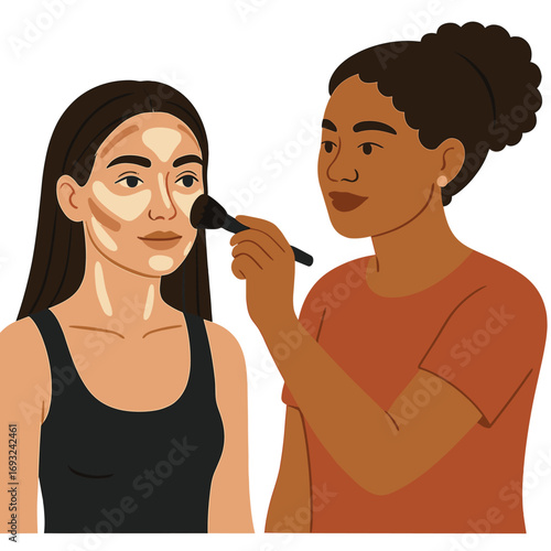 A young multiracial woman demonstrates how to apply contour and highlight makeup with a brush while receiving a professional face contouring session