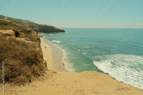 Sunset cliffs beach in ocean beach san diego during summer time, beach goers and people swimming