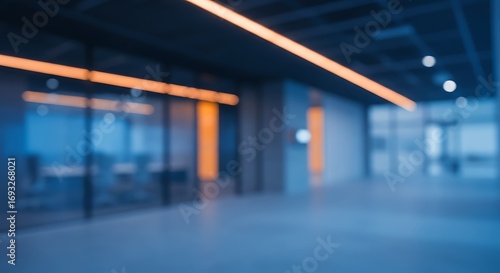 abstract blur modern interior inside entrance building of office in blue background with orange light effect concept