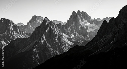 a black and white photo of a mountain range