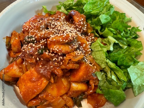 Korean Spicy Stir-Fried Pork and Squid (Osam Bulgogi) with Sesame Seeds