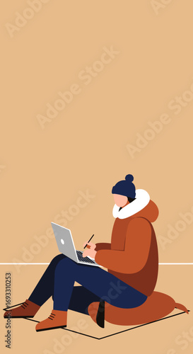 Person in winter attire casually working or studying on a laptop. Ideal for concepts of remote work, freelancing, digital nomad lifestyle, or creative productivity.