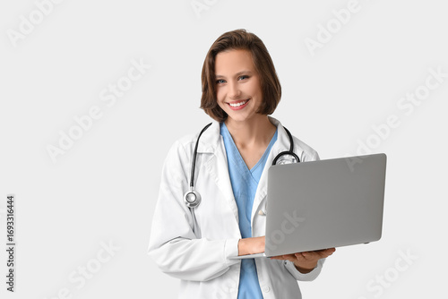 Beautiful female doctor wit...
