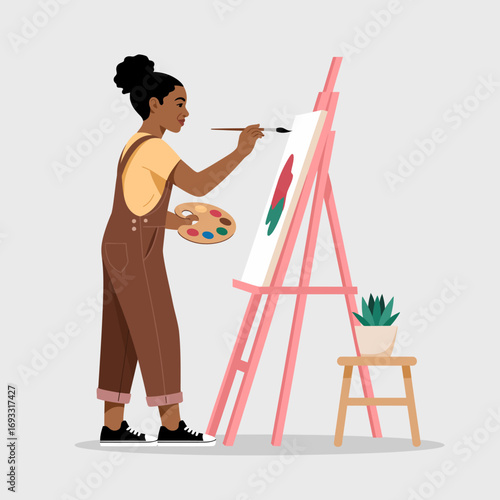 A young artist passionately paints on a canvas, showcasing their creativity and artistic skills, surrounded by vibrant colors and an inspiring atmosphere.